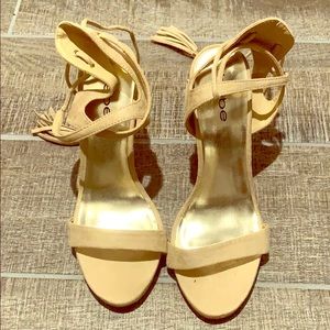 Size 7 Bebe tanned heels